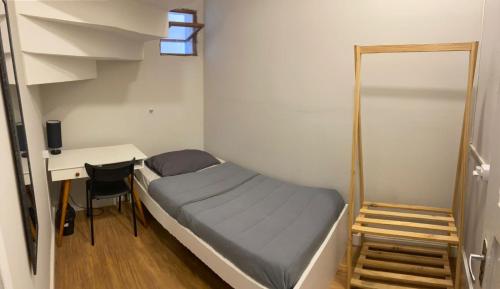Postel nebo postele na pokoji v ubytování Gup Hostel