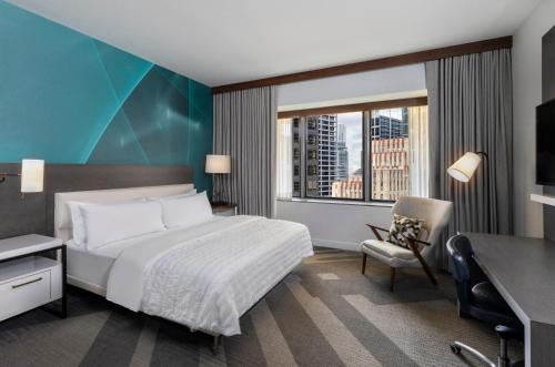 Ліжко або ліжка в номері Le Meridien Houston Downtown