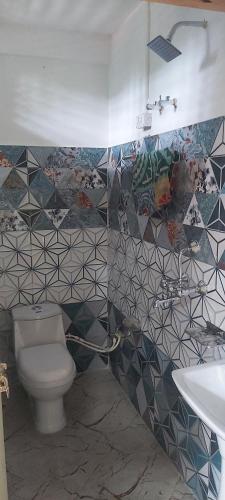 Kupatilo u objektu Eviana homestay