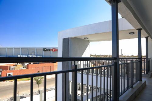 a view from the balcony of a building at Sarona City Alpha Apartment L303 in Gaborone