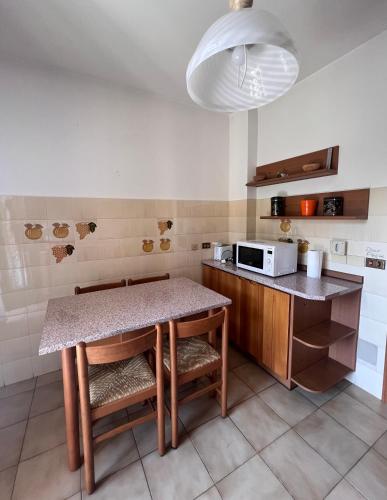 Kuchyň nebo kuchyňský kout v ubytování Appartamento CASA DEI NONNI