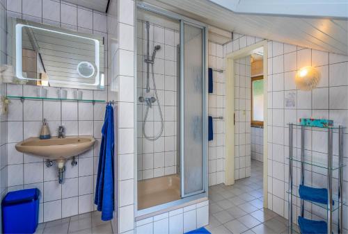 a bathroom with a shower and a sink at Ferienwohnungen Gstöttner in Bodenmais
