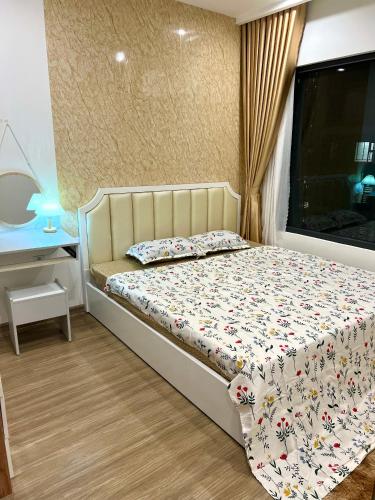 a bedroom with a bed and a window at Smart homestay in Hanoi