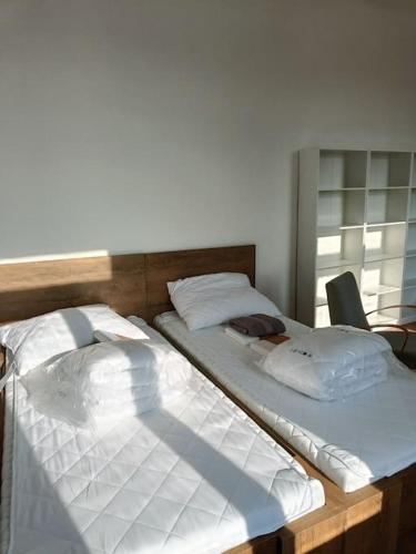 Ліжко або ліжка в номері Apartmán Procyon