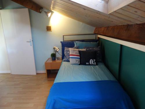 Ένα ή περισσότερα κρεβάτια σε δωμάτιο στο L'Enclos B&B