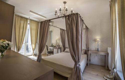 Ένα ή περισσότερα κρεβάτια σε δωμάτιο στο Casa Andrea