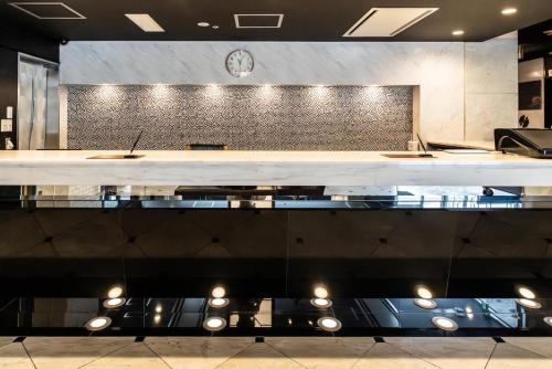 Η κουζίνα ή μικρή κουζίνα στο Hotel LiVEMAX Umeda Central