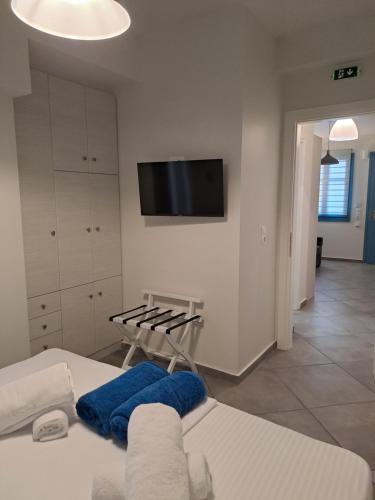 Кровать или кровати в номере Kyveli LuxuryRooms