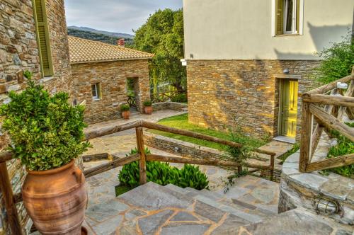 a view from the balcony of a house at Iro Suites in Andros