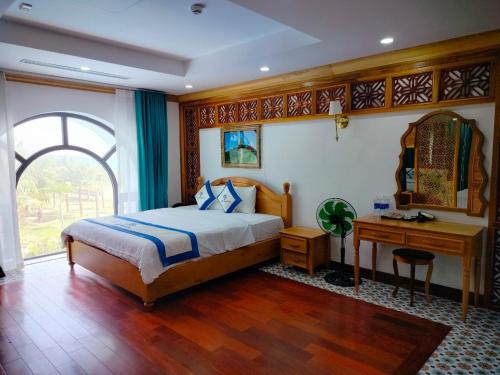 Giường trong phòng chung tại Phuc Thuan Hotel