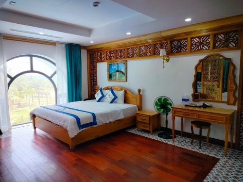 Giường trong phòng chung tại Phúc Thuận Hotel