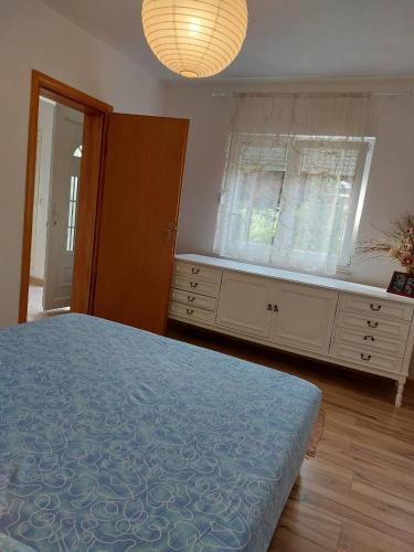 Apartmani Nedaにあるベッド