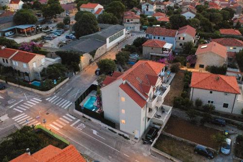 an aerial view of a small town with buildings at Deluxe apartment BRAČOLET private pool in Supetar
