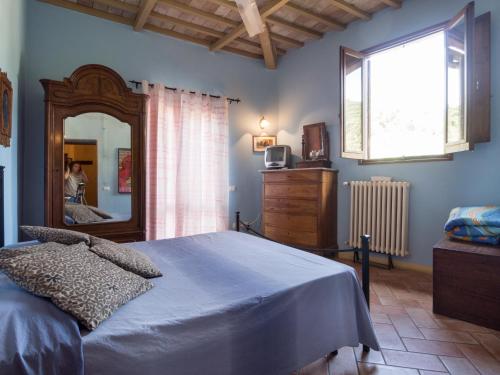 Ένα ή περισσότερα κρεβάτια σε δωμάτιο στο La Loggia Sul Nera