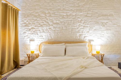 Кровать или кровати в номере Casa Castelvecchio