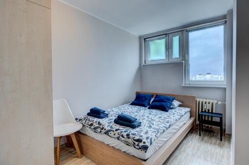 Postel nebo postele na pokoji v ubytování Apartament Szczecin Kobalt - Kaskada