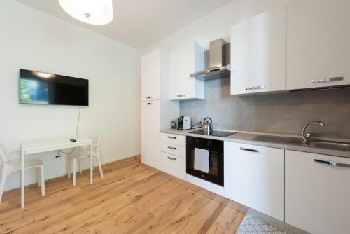 Una cocina o cocineta en Paola Maison NEW APARTMENT!