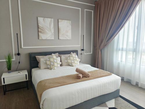 Ένα ή περισσότερα κρεβάτια σε δωμάτιο στο Two Bedroom Troika Kota Bharu by AGhome