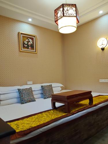 Un lugar para sentarse en Pingyao Hu lu wa Home Inn