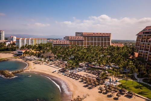 an aerial view of a resort with a beach and buildings at The Westin Resort & Spa, Puerto Vallarta in Puerto Vallarta