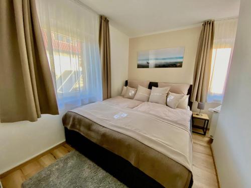 Postel nebo postele na pokoji v ubytování Haus-Holiday-Ferienhaus-in-Bad-Sachsa