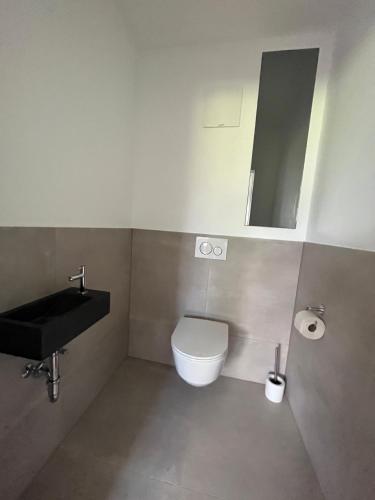 Koupelna v ubytování Villa Turnersee
