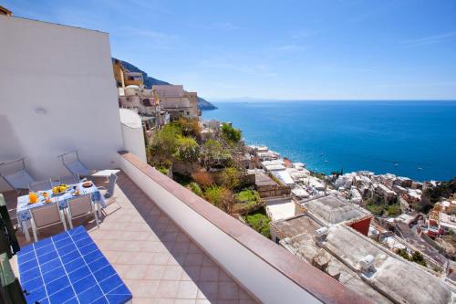 a balcony with a view of the ocean at Estate4home - Casa Darly in Positano