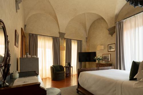 Cama o camas de una habitación en Loggiato Dei Serviti