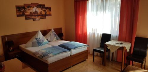 Postel nebo postele na pokoji v ubytování Villa Carmen