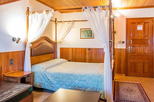 Katil atau katil-katil dalam bilik di Hotel Apollon