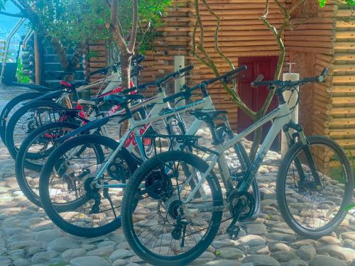 a group of bikes parked next to a building at Pu Luong Jungle Lodge in Pu Luong