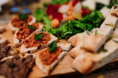 a close up of a plate of food with vegetables at Agriturismo Villa Le Vigne in Montevarchi