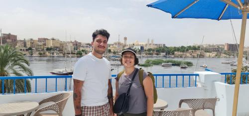 a man and a woman standing on a boat at La Terrace in Aswan