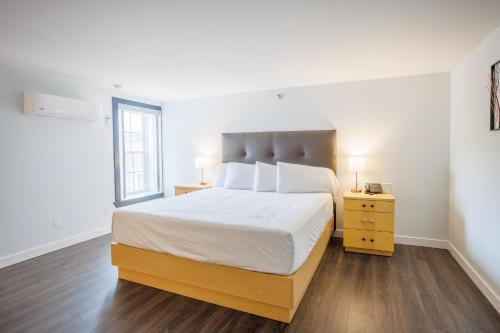 Postel nebo postele na pokoji v ubytování Hotel Callista