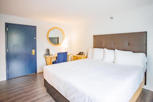 Postel nebo postele na pokoji v ubytování Hotel Callista