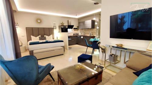 Foto HOMELY STAY Studio P1 - Elegant Self-Check-in Studio-Apartment in Munich -with Kitchen and Washing Machine 5