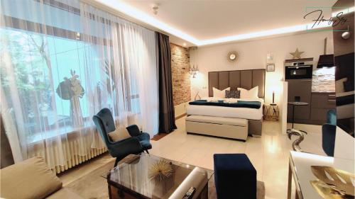 Foto HOMELY STAY Studio P1 - Elegant Self-Check-in Studio-Apartment in Munich -with Kitchen and Washing Machine 2