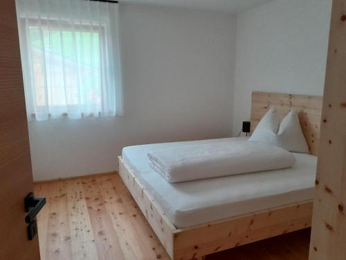 Postel nebo postele na pokoji v ubytování Innerpasthof