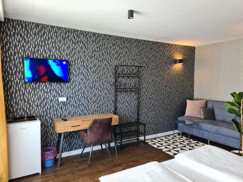 TV a/nebo společenská místnost v ubytování Prestige by Privilege Felix
