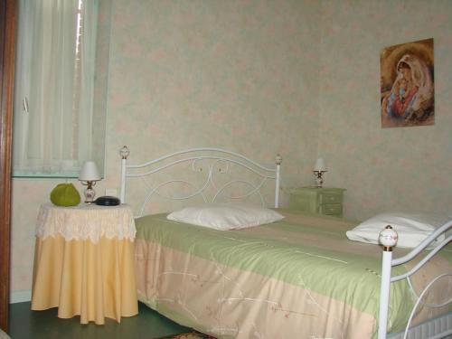 Una cama o camas en una habitación de VERDIER Marie
