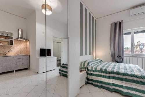 Postel nebo postele na pokoji v ubytování Ursa Apartment