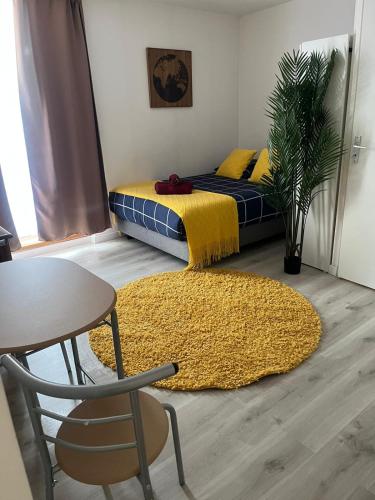 Ένα ή περισσότερα κρεβάτια σε δωμάτιο στο STUDIO LIMBO CHAMONIX HYPER CENTRE Vue imprenable sur le Mont-blanc