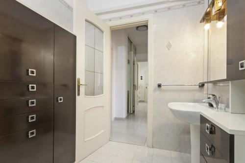 a bathroom with a sink and a mirror at Casa Giovanna by Wonderful Italy in Bari