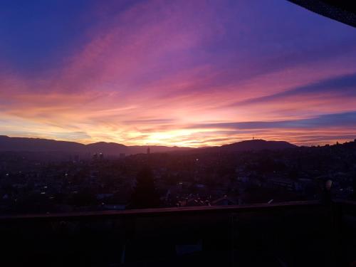 a sunset view of a city with the sky at Sarajevo Sky View in Sarajevo