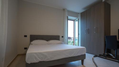 Hice Room Lungomare Fronte Mareにあるベッド