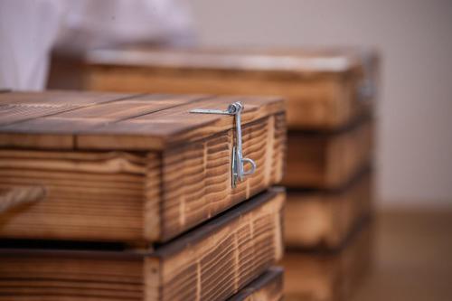 a stack of old books with a metal latch at Women's Only Hostel - Female Only in Prague