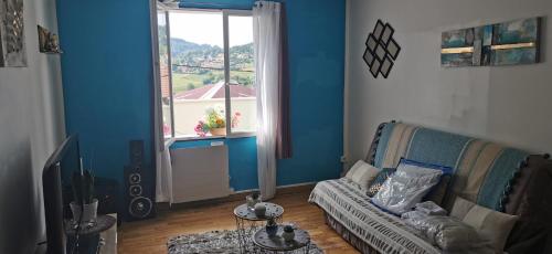 O zonă de relaxare la Appartement au coeur de Cours La Ville