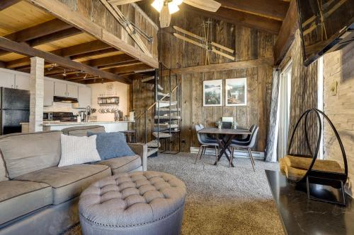 a living room with a couch and a table at Townhome with Mtn View - Walk to Brian Head Lifts! in Brian Head