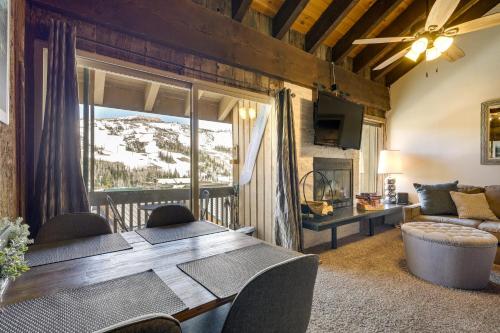 a dining room with a table and a couch at Townhome with Mtn View - Walk to Brian Head Lifts! in Brian Head