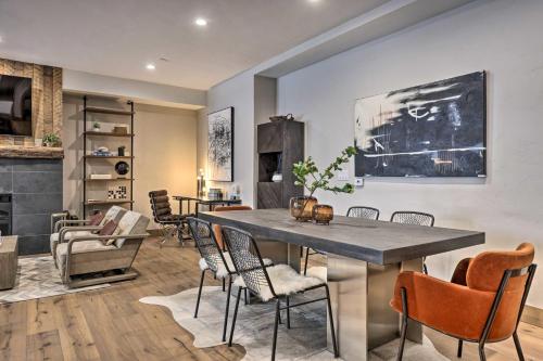 a dining room with a table and chairs at Winter Park Condo w/Hot Tub & 4 Mi to Skiing in Winter Park